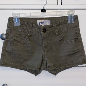 Green shorts with lace hemline